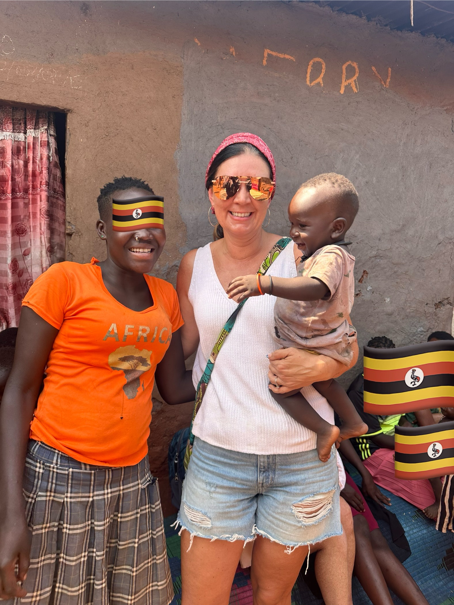 HGI Director visiting with momma and baby in Empower Woman program