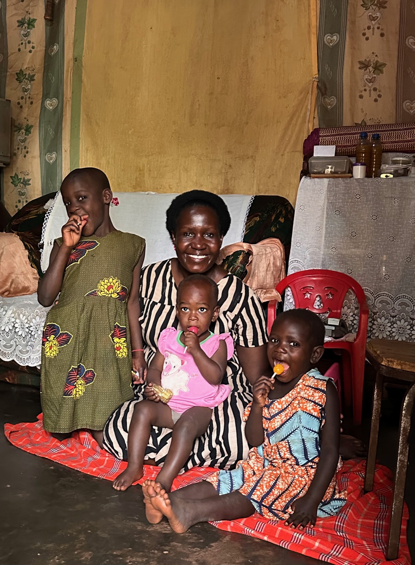 Damalie with one of the families in the Shiloh Family Program